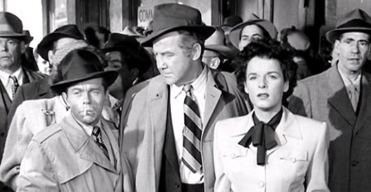 The short, scary man smoking the cigarette?  That's Walter Burke.