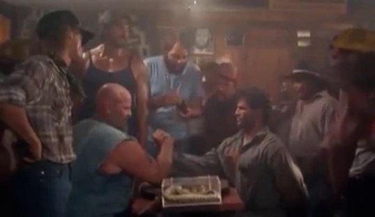 The rattlesnake arm wrestling scene.